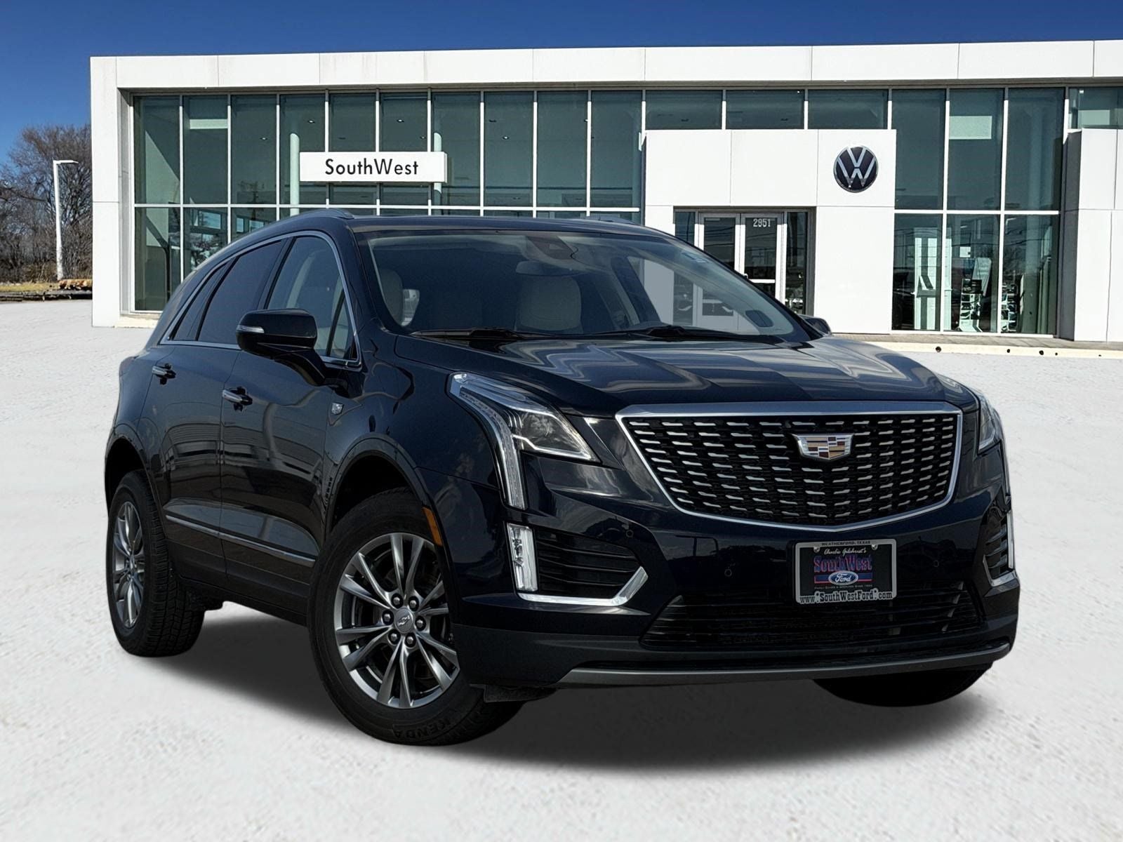 2021 Cadillac XT5 Premium Luxury in Dark Moon Blue Metallic — front three-quarter view