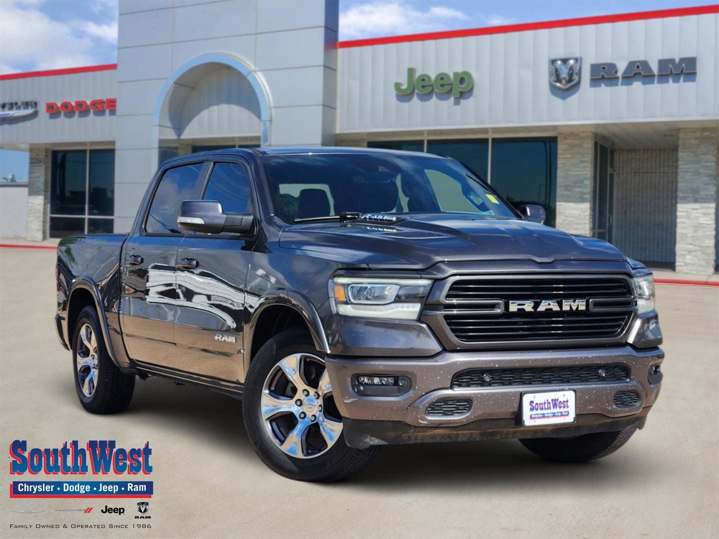 2022 RAM Ram 1500 Laramie Crew Cab 4x2 5'7' Box in Granite Crystal Metallic Clearcoat — front three-quarter view