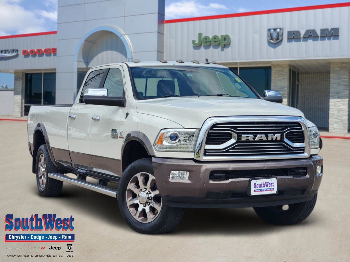 2018 RAM Ram 3500 Laramie Longhorn Crew Cab 4x4 8' Box in Pearl White — front three-quarter view