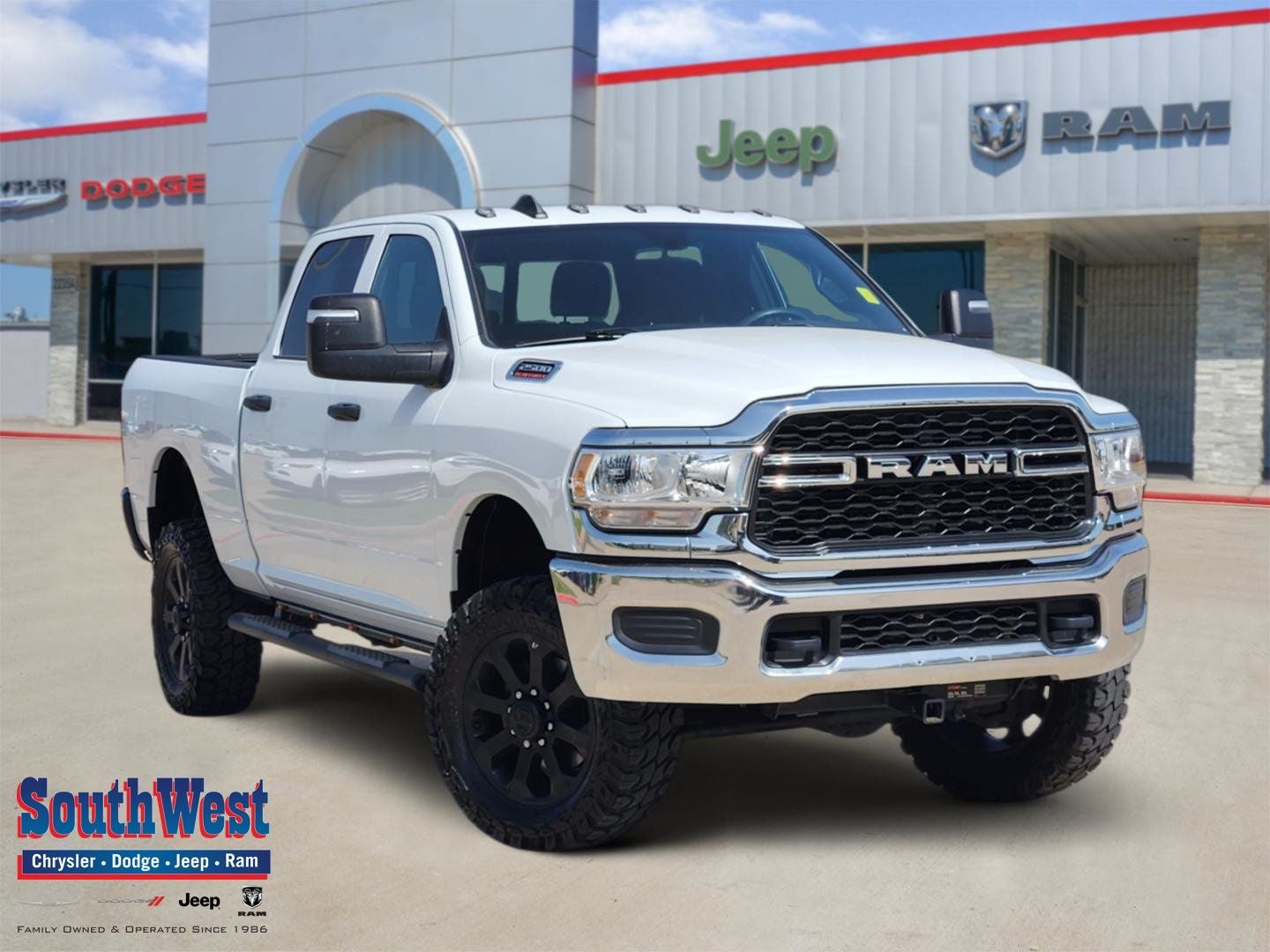 2024 RAM Ram 2500 Tradesman Crew Cab 4x4 6'4' Box in Bright White Clearcoat — front three-quarter view