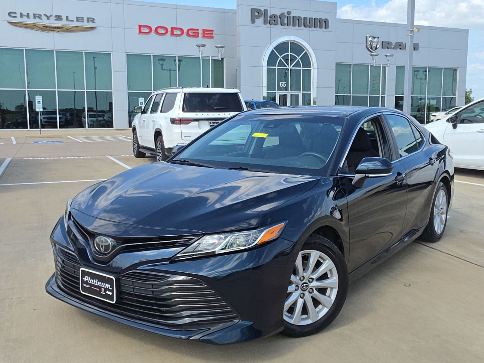 2018 Toyota Camry L in Aqua — front three-quarter view