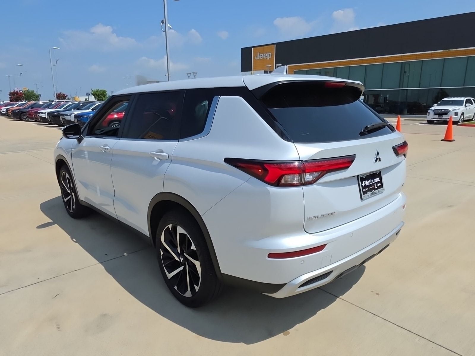 2024 Mitsubishi Outlander — rear three-quarter view