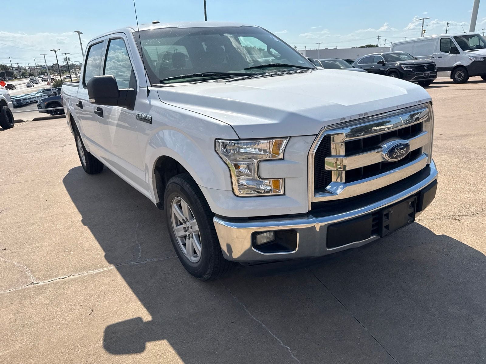 2016 Ford F-150 XLT in Oxford White — front three-quarter view