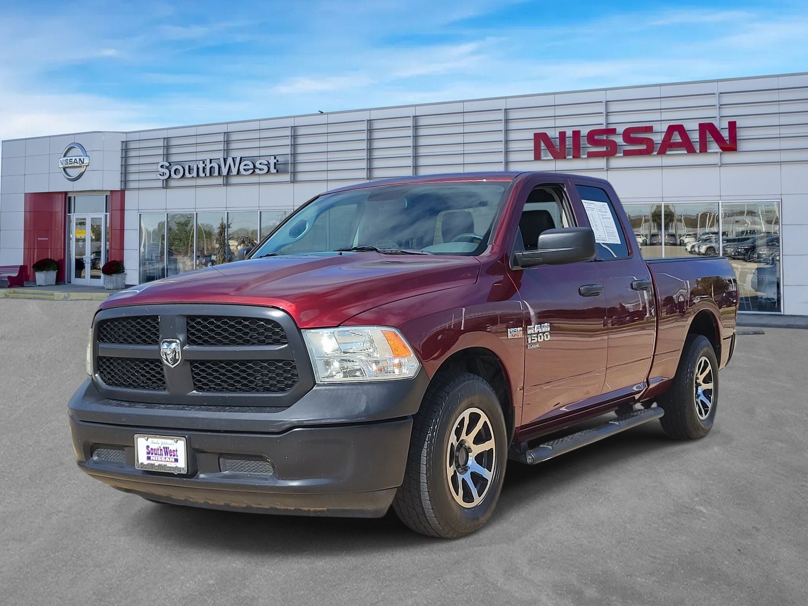 2019 RAM 1500 Classic Tradesman in Delmonico Red Pearlcoat — front three-quarter view