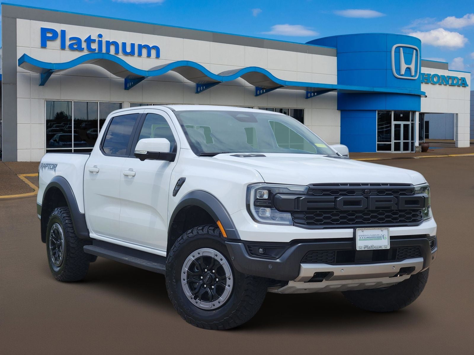 2024 Ford Ranger Raptor in Oxford White — front three-quarter view
