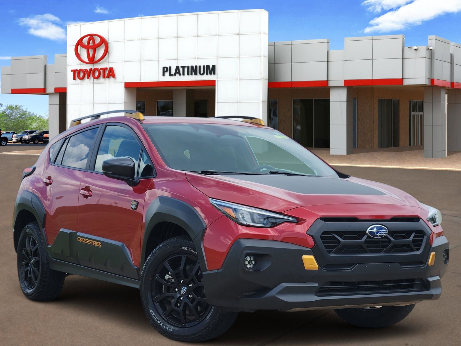 2024 Subaru Crosstrek Wilderness in Lithium Red Pearl — front three-quarter view