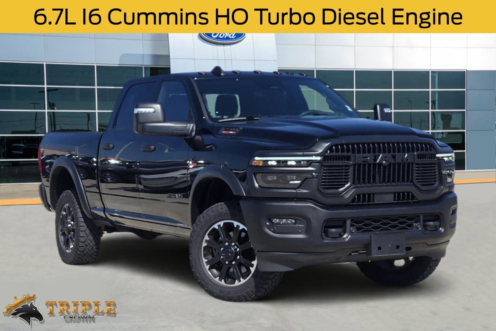 2026 RAM 2500 Rebel in Diamond Black Crystal Pearlcoat — front three-quarter view