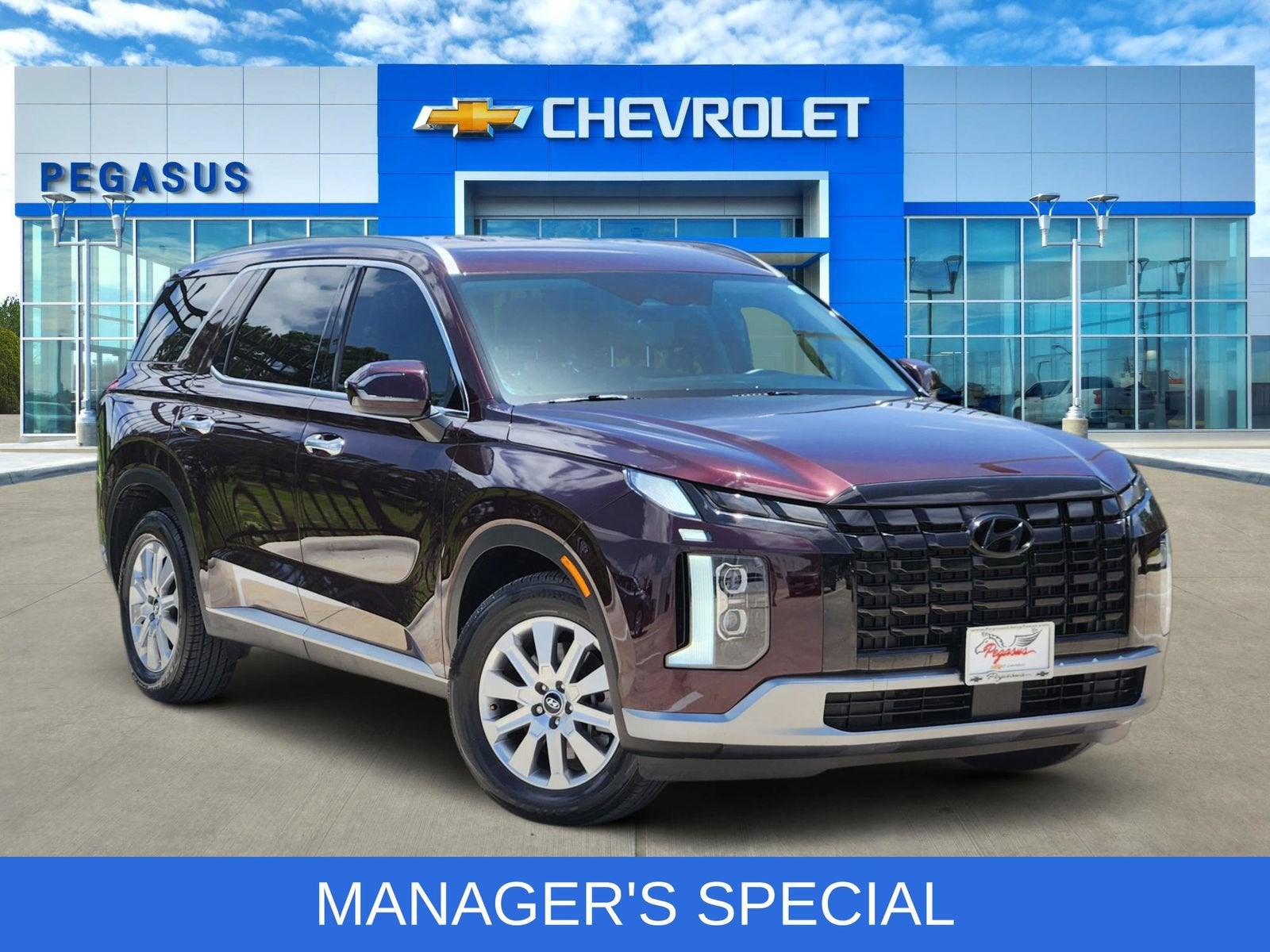 2024 Hyundai Palisade SEL in Red — front three-quarter view