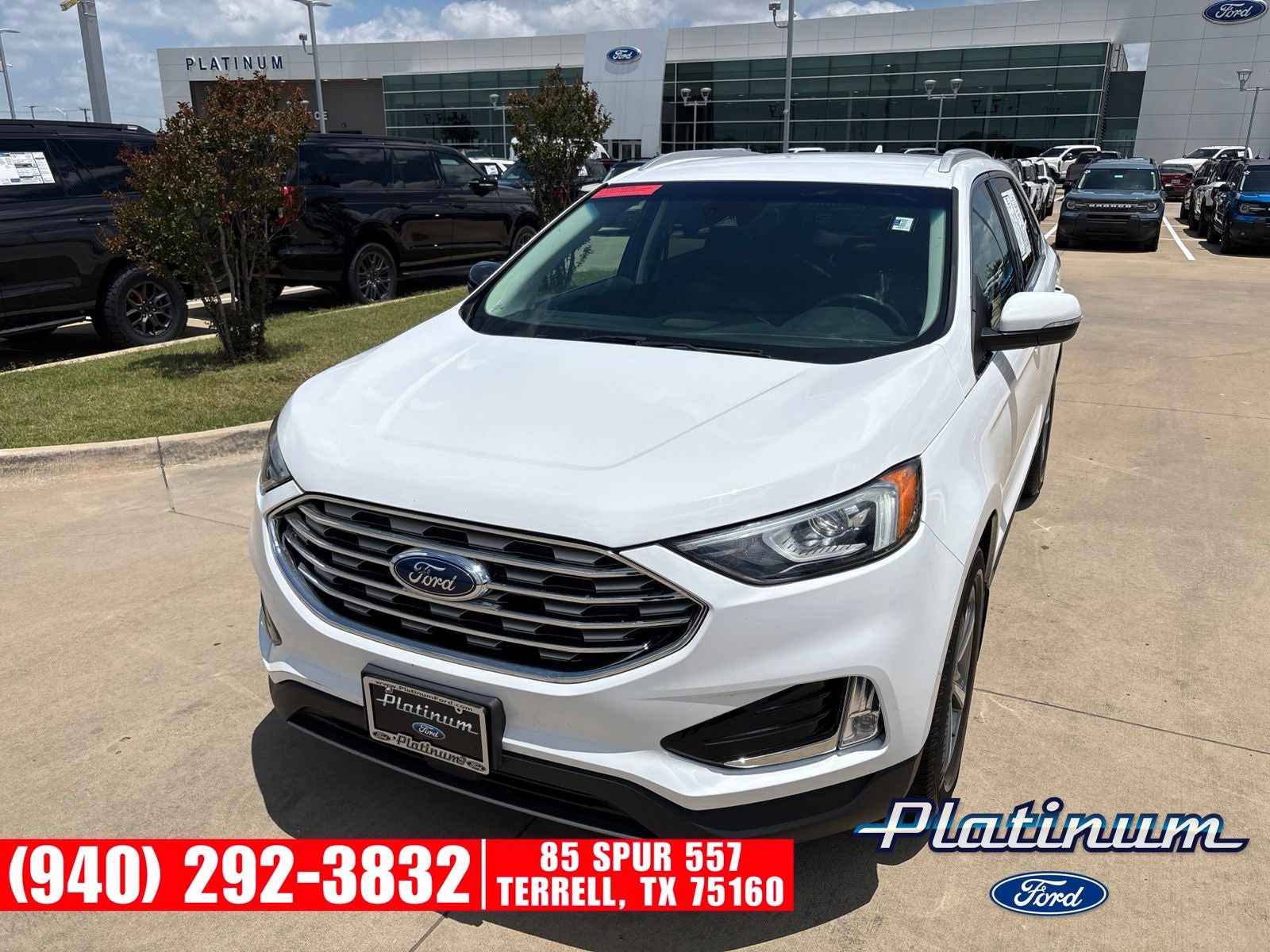 2019 Ford Edge SEL in Oxford White — front three-quarter view