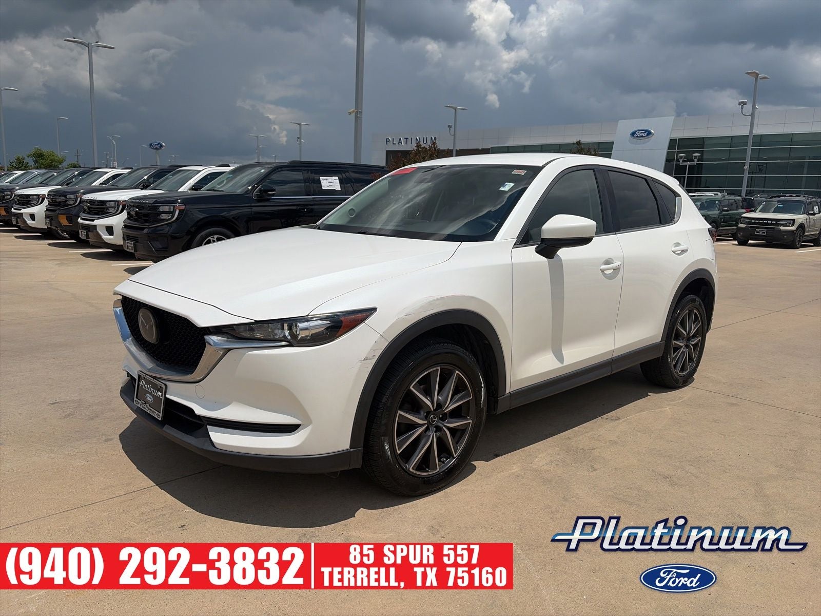 2018 Mazda Mazda CX-5 Touring in Snowflake White Pearl — front three-quarter view